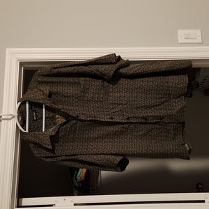 Men's short sleeve button up shirt. 2XL black with gold design.